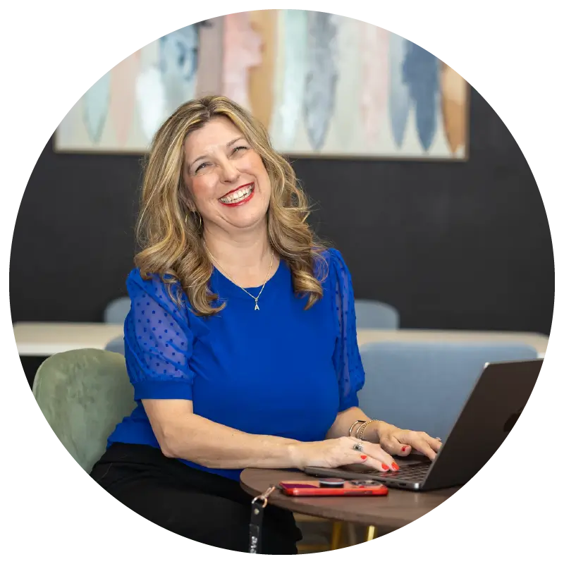 Chapter President Signup - a woman working on UnBreakable Business